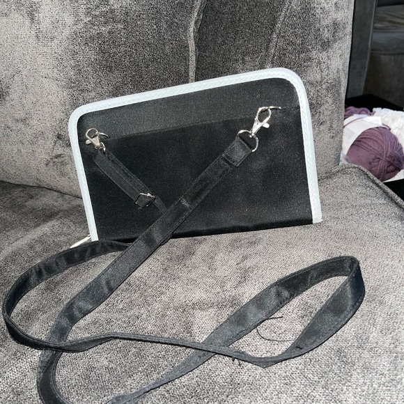 Crossbody bag with multiple pockets. 8 card slots. 9.5 inches x 6.5 inches. - Picture 3 of 3